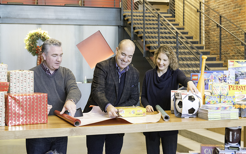 Shawmut Design and Construction donates $26,000 worth of toys through Project Happier Holidays