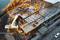 Eastman Cooke resumes building two Jaguar/Land Rover dealerships