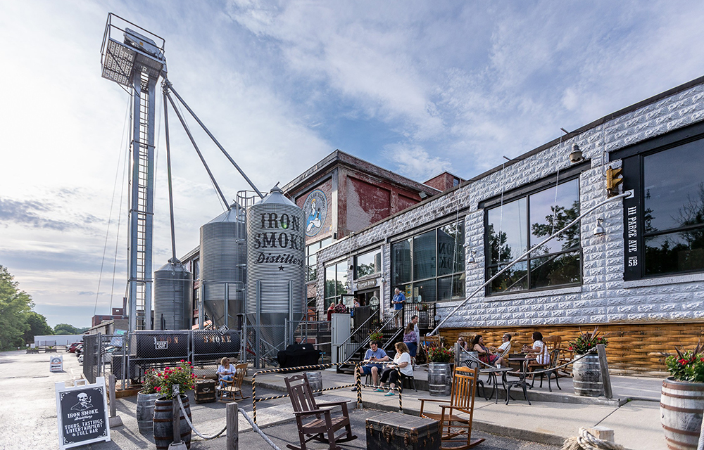 Iron Smoke Distillery celebrates 15 years, secures its future with purchase of 20,000 s/f facility