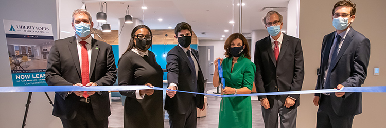 WinnCompanies celebrates ribbon cutting at Liberty Lofts at Sibley Sq. in Rochester