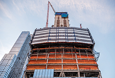 Product of the Month: Self-Climbing Kokoon Perimeter Protection System by Despe takes NYC projects to new heights