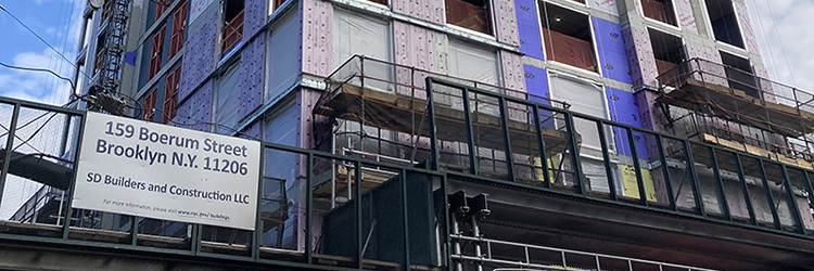 Aufgang Architects and Slate Property Group <br>top out 116,000 s/f multifamily building 