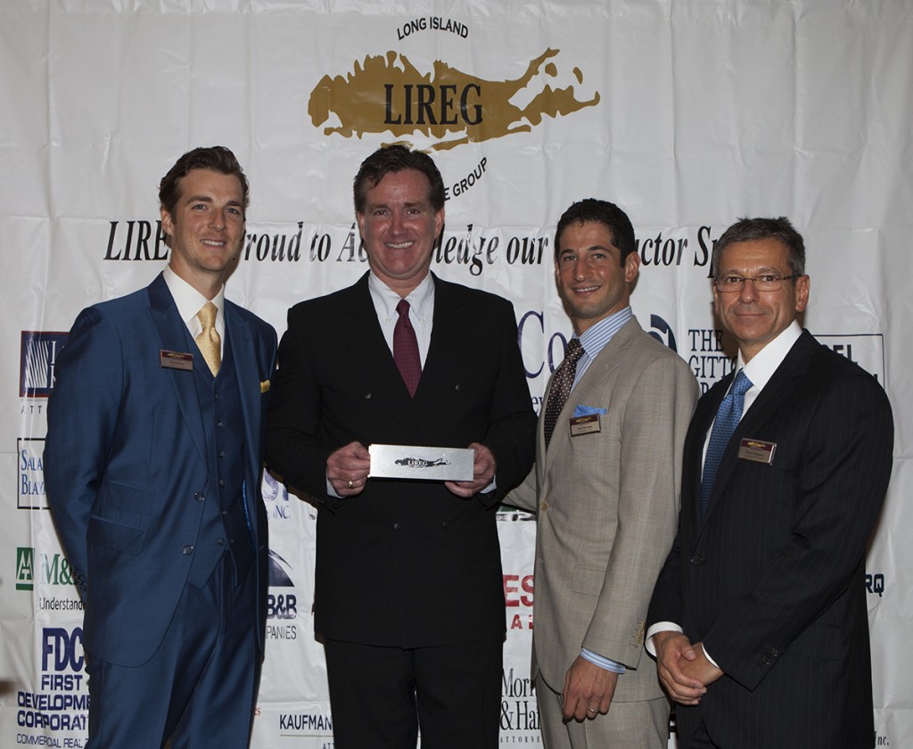 LIREG breakfast committee co-chair A.J. Johnston, Flanagan, LIREG co-president Scott Burman and LIREG co-president  Peter Schapero.