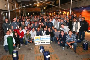 Matt Schmeelk, Kensington Vanguard National Land Services, in the front row at far right, with the entire group at the Real Estate Executive Sleep Out event.