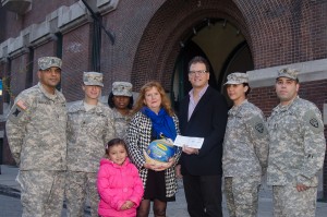 Shown (from left) are: Master Sergeant, Israel Mahadeo (Huntington, NY), Sergeant Amanda Castaneda  (Bronx, NY), Beth Delli-Pizzi, David Blumenfeld, Sergeant Patricia Rios (Middletown, NY) and Sergeant  1st Class, Xavier Varges (Bronx, NY) who is joined by his four-year-old daughter Isabella Varges.