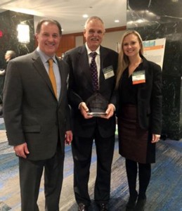 Shown (from left) are: Executive vice president at First Sterling Financial Victor Sostar, DePaul president Mark Fuller and assistant vice president at First Sterling Financial Mary Dorn.