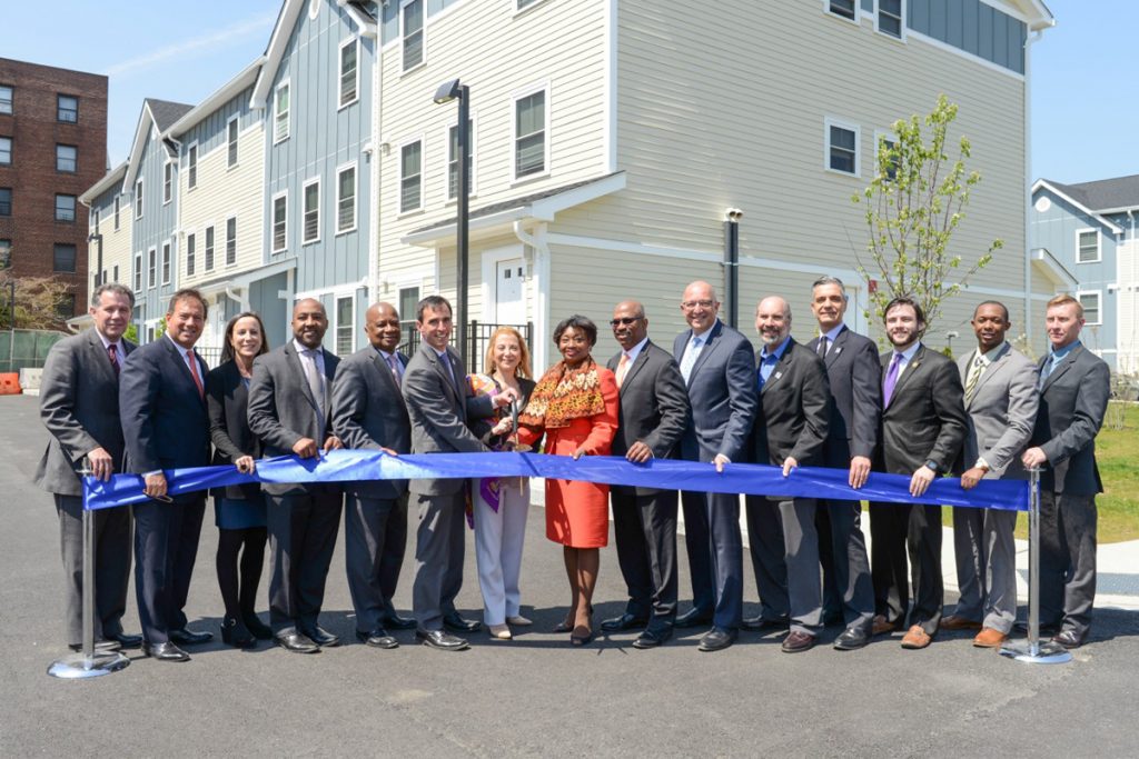 Shown (from left) are: city manager Charles Strome; MacQuesten managing director Joseph Apicella; Jane Silverman, executive director of community development banking for Chase; councilman Jared Rice; Greg Watson, assistant regional commissioner of NYS HCR; mayor Noam Bramson; MacQuesten president Rella Fogliano; state senator Andrea Stewart-Cousins; Municipal Housing Authority executive director Steven Horton; Dominick Buffa, managing director of First Sterling Financial; councilman Barry Fertel; commissioner of development Luiz Aragon; Jay Wegimont representing U.S. congressman Eliot Engel; Tyrae Woodson-Samuels representing U.S. congressman Eliot Engel; and MacQuesten project manager Kurt Purves.