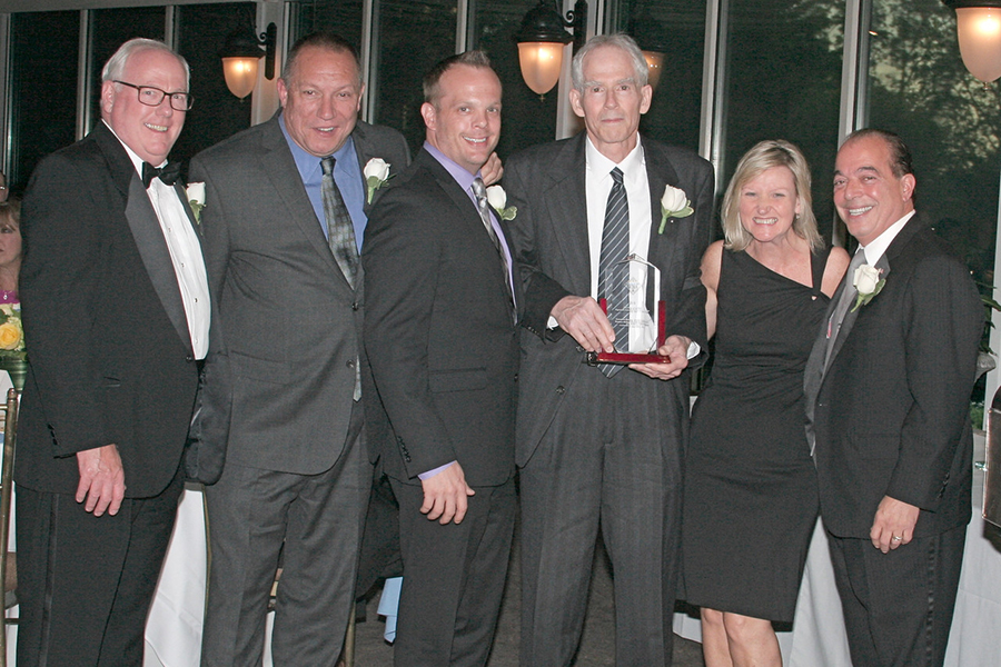 Shown (from left) are: William Bassett, Joseph Roccuzzo, Kevin Ullrich, Robert Melly, Caroline Molloy, and Anthony Lifrieri.