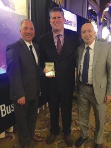 Shown (from left) are: Scott Schoen, publisher, LIBN; Michael Zere, Zere Real Estate Services; and David Winzelberg, LIBN journalist and host for the Annual LIBN Real Estate Awards.