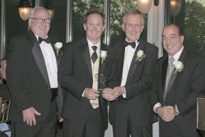 Shown (from left) are: BOMA Westchester president William Bassett; EF Education First headmaster Brian Mahoney; EF Education First Executive Director Philip Johnson; and former BOMA Westchester president Anthony Lifrieri, who served as program emcee.