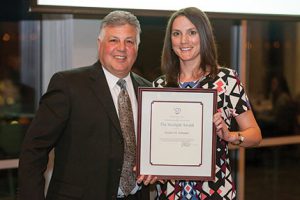 CSI Rochester president Ken Christiano and Kristin Schuster of SWBR Architects, winner of CSI Rochester’s Startlight Award