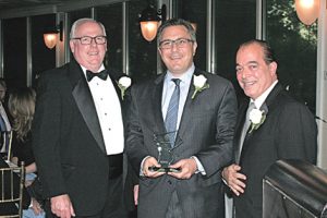 Shown (from left) are: William Bassett, BOMA president; Richard Gottlieb of Keystone; and Anthony Lifrieri, former BOMA president and emcee. 