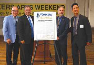 Shown (from left) are: Randolph Rose, mayor Mike Spano, Michael Sabatino, and George Huang 
