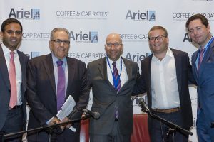 Shown (from left) are: Blackstone's Qahir Madhany, Madison Realty Capital's Michael Stoler, Shimon Shkury of Ariel Property Advisors, Ben Curtiss of  Kushner Companies, and Jason Hart from The Carlyle Group. 