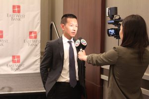 Do being interviewed during a speaking engagement on cross border financing.