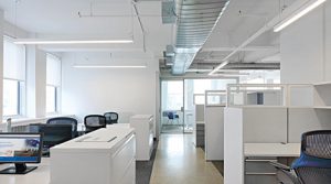 Workstations at CBC Advisors New York office at 1407 Broadway