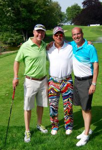 Shown (from left) are: Eric Launer, CIBS golf chair John LaRuffa and David Leviton.
