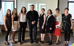 Shown (from left) are: Kristina Tougas, intern PWC; Frances Wilson, development coordinator, PWC; Chelsea LeMar, executive director, PWC; Kai-Uwe Bergmann, partner, BIG; Michelle Stromsta, senior architect, BIG; Deb Campbell, QAQC manager, BIG; Liz McDonald, designer, BIG; and Jenny Dudgeon, senior architect, BIG.