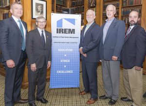 Shown (from left) are: Joe McMillan; IREM Greater NY chapter president Paul Gottsegen, CPM; IREM Greater NY chapter first VP Stephen Masom, CPM; and event sponsors Chris Porter and Adam Marchial, both from Macinnis Ward & Associates.