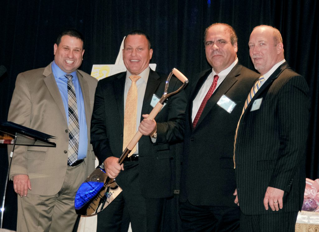 Shown (from left) are: Andrew Meyerson, CFMA event chair and CFO of Axis  Construction; Alan Nahmias, co-founder of CFK and president of Stalco; Steven  DeLuca, CFK president and 1st vice president of Suffolk County National Bank;  and Stephen Ebinger, president of CFMA Long Island chapter and partner in  the Jericho office of CohnReznick LLP. Photo credit: Maven Jade.