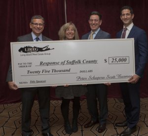 Shown (from left) are: Peter Schapero, co-president of LIREG; Meryl Cassidy, executive director of Response, Richard Herzbach, LIREG charity committee chair; and Scott Burman, co-president of LIREG.