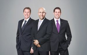 Shown (from left) are: Michael Tortorici, Shimon Shkury and Victor Sozio of Ariel Property Advisors